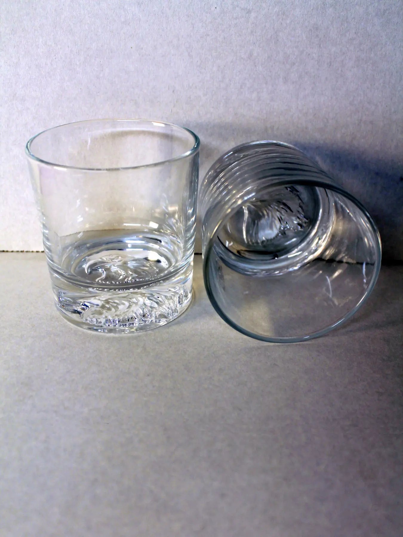 Whiskey Glass Set Of 2 - (2) 10.6oz thick bottom whiskey glasses, each with the head of a majestic American bald eagle etched into the bottom